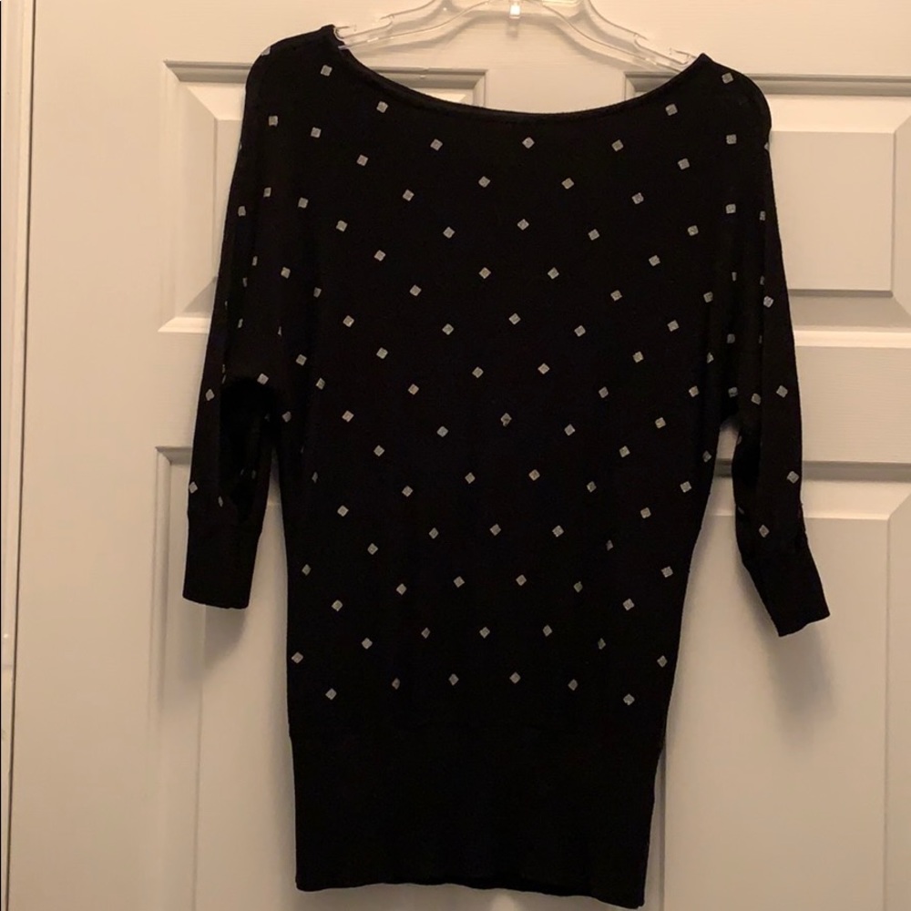 Quarter length sleeve black sweater